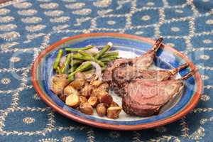 Rack of lamb with roasted golden baby potatoes