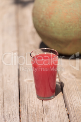 Pink glass of red watermelon fruit juice