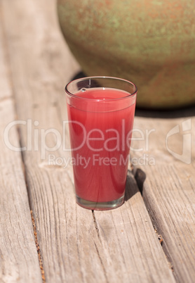 Pink glass of red watermelon fruit juice