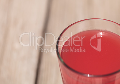 Pink glass of red watermelon fruit juice drink