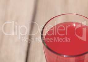 Pink glass of red watermelon fruit juice drink