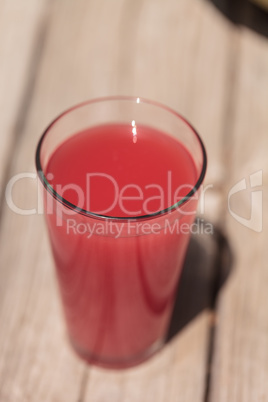 Pink glass of red watermelon fruit juice