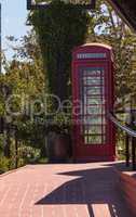 Old fashioned antique classic red phone booth