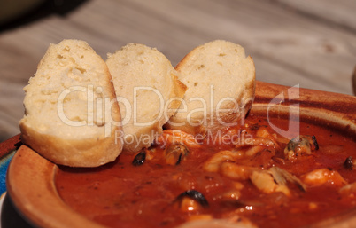 Seafood cioppino with French bread