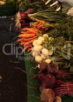 Yellow beets, orange carrots and red onions