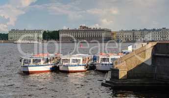 Landscape of Neva river and boats in cloudy day in Saint-Petersb