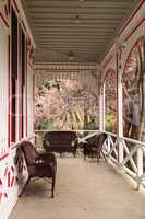 Red and white porch of a Victoria cottage