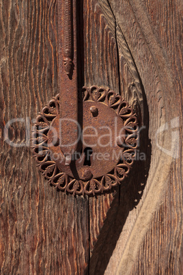 Ornate rusty door keyhole