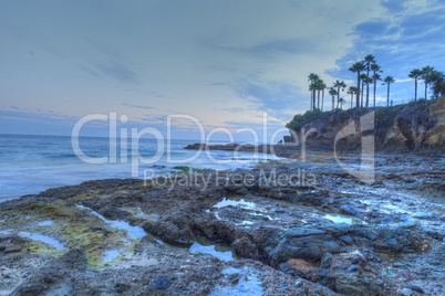 Sunset over the rocks at Shaws Cove in Laguna Beach