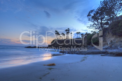 Sunset over the rocks at Shaws Cove in Laguna Beach