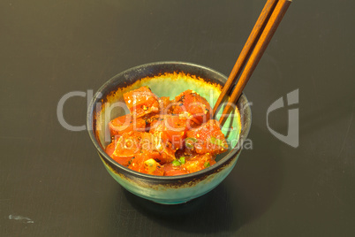 Poke lunch bowl of spicy raw tuna sushi