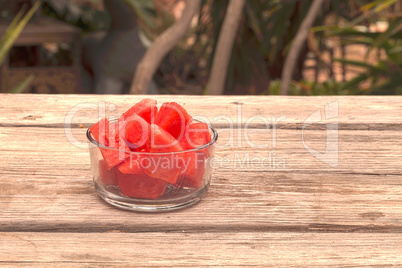 Glass bowl of sliced watermelon