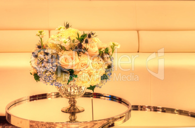 Wedding bouquet in a silver vase
