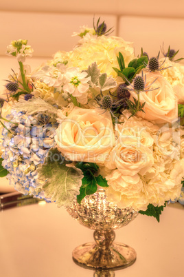 Wedding bouquet in a silver vase