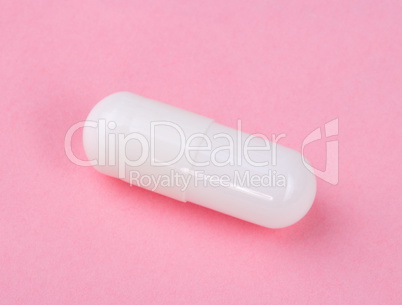 White Pill on Pink Background