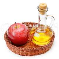 apple cider vinegar and apples isolated on white background