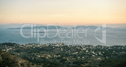 Sunrise view of mountains and sea on Aegina island, Greece.