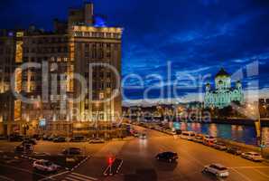 Moscow night landscape with road and river and church of Christ