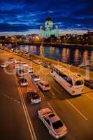 Moscow night landscape with road and river and church of Christ