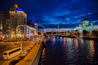 Moscow night landscape with road and river and church of Christ