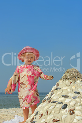 Little girl on a sea beach