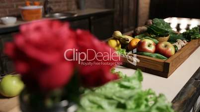 Fresh market fruits and vegetables in wooden tray