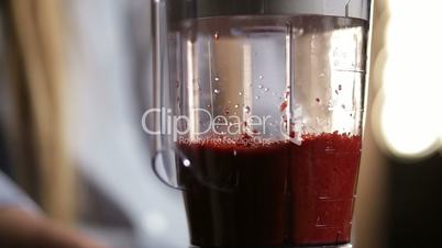 Closeup blender shaker jug making beet smoothie