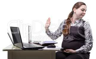 Lazy young pregnant woman at work