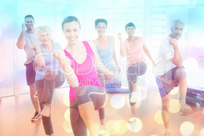 Composite image of smiling people doing power fitness exercise at yoga class