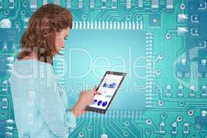 Composite image of businesswoman using tablet over white background