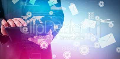 Composite image of businessman using digital tablet
