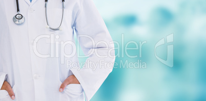 Composite image of female doctor standing with hands in pocket