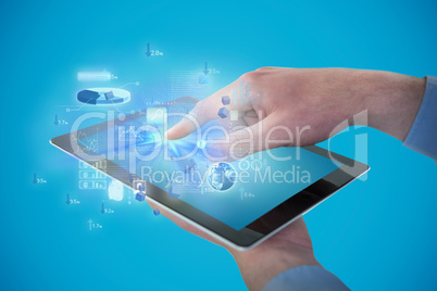 Composite image of croped hands of businessman using digital tablet