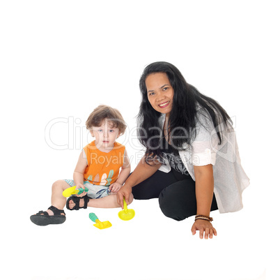 Nanny plays with little boy.