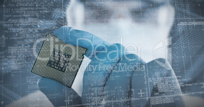 Composite image of male doctor in protective glasses and surgical mask holding electronic chip
