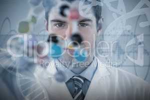 Composite image of young scientist experimenting molecule structure