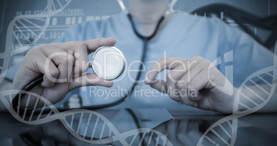 Composite image of mid-section of female doctor examining digital tablet with stethoscope