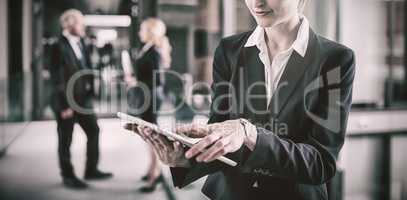 Businesswoman using digital tablet