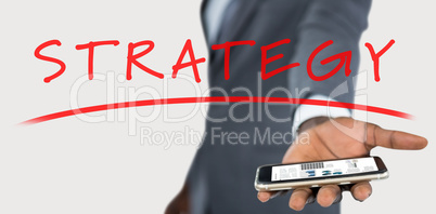 Composite image of businessman holding mobile phone