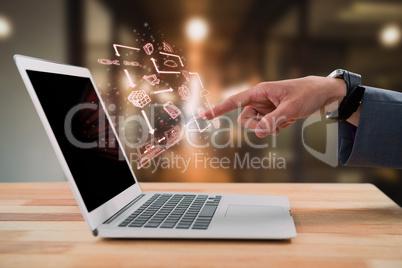 Composite image of businessman gesturing at laptop screen