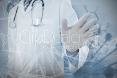 Composite image of doctor touching an digital screen