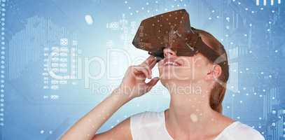 Composite image of close up of woman using virtual reality headset