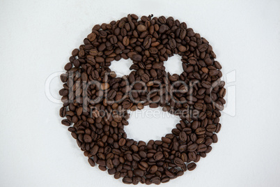 Coffee beans forming face