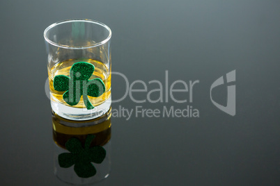 St Patricks Day glass of whisky with shamrock