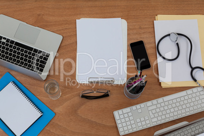 Clipboard with keyboard and mouse on table