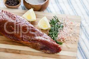 Beef steak and ingredients on wooden board