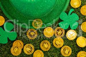 St. Patricks Day leprechaun hat, shamrocks and chocolate gold coins