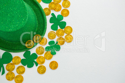 St. Patricks Day leprechaun hat, shamrocks and chocolate gold coins
