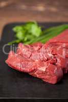 Beef steak on black slate plate