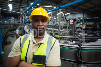 Portrait of confident factory worker at factory